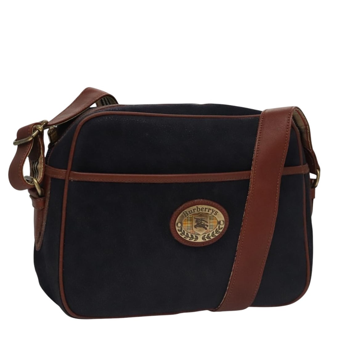 Burberrys Navy Suede Shoulder Bag Adjustable Strap Made in Italy: Burberrys Navy Suede Shoulder Bag Adjustable Strap Made in Italy This Burberrys shoulder bag showcases a classic navy suede exterior, embodying timeless elegance and practicality. Designed for daily u
