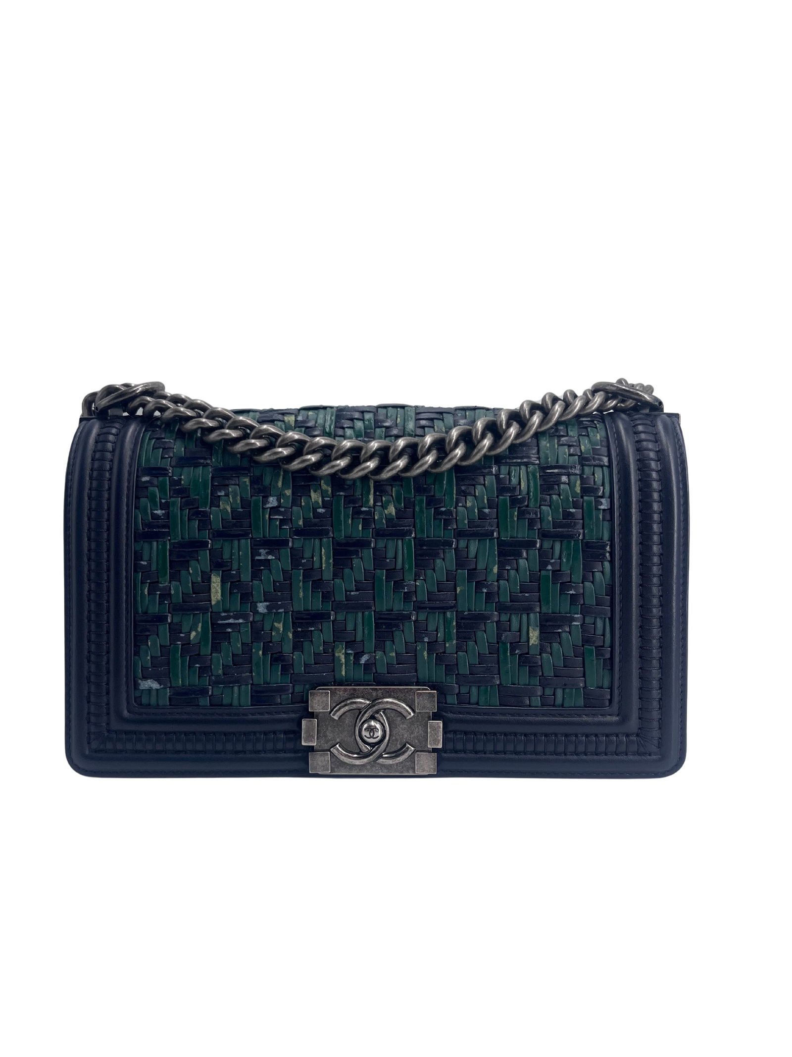 Blue Chanel Boy Crossbody Clutch Bag: Blue Chanel Boy Crossbody Clutch Bag This pre-owned Chanel Boy clutch shoulder bag in blue is designed for female use and functions as a crossbody bag. It shows noticeable signs of wear, including med