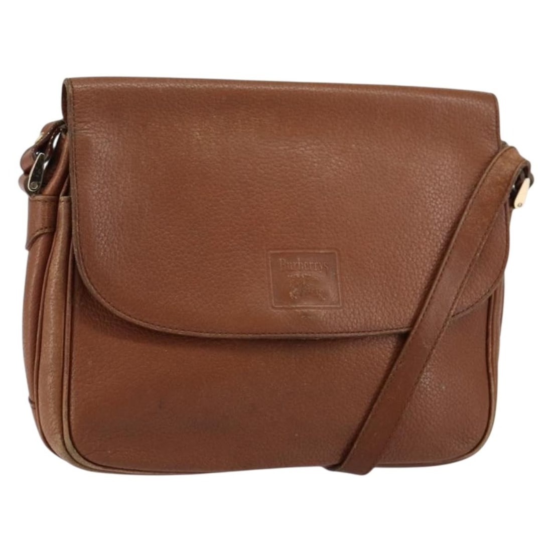 Burberrys Leather Shoulder Bag Gold Brown Authentic: Burberrys Leather Shoulder Bag Gold Brown Authentic This Burberrys shoulder bag is expertly crafted from leather in an elegant gold and brown colorway. With a compact design, it measures approximately