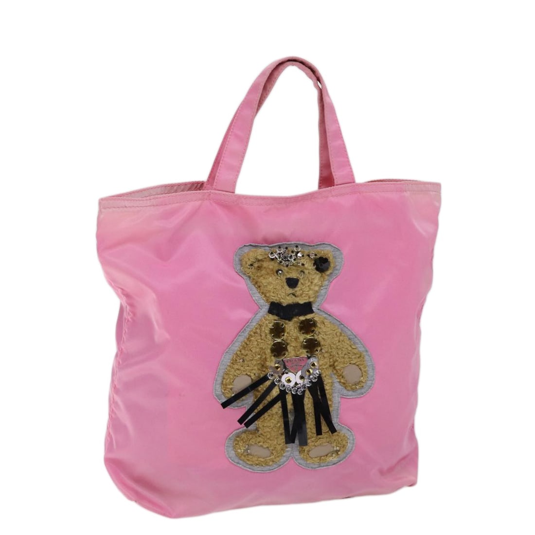 PRADA Pink Nylon Hand Bag Made in Italy: PRADA Pink Nylon Hand Bag Made in Italy Introducing a stylish PRADA Hand Bag crafted in durable nylon. This vibrant pink handbag is perfect for adding a pop of color to your outfit. Measuring approxim