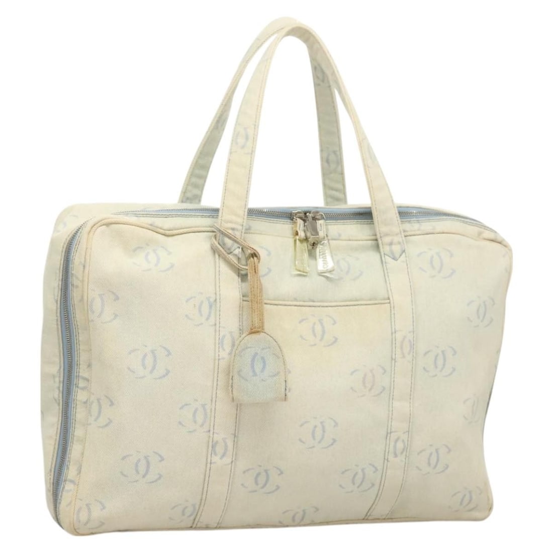 CHANEL Light Blue Canvas Hand Bag Silver Accents Auth 126457: CHANEL Light Blue Canvas Hand Bag Silver Accents Auth 126457 This authentic CHANEL hand bag showcases a stylish light blue and silver color scheme, crafted from durable canvas. Designed in Italy, this