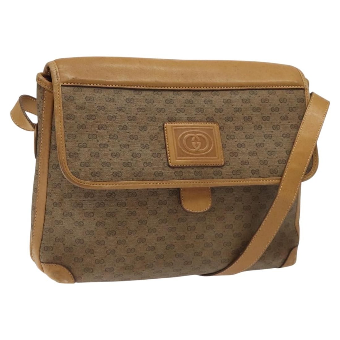 GUCCI GG Supreme Beige Gold Shoulder Bag PVC 001 261 0688 Made in Italy: GUCCI GG Supreme Beige Gold Shoulder Bag PVC 001 261 0688 Made in Italy This GUCCI GG Supreme Shoulder Bag is crafted from durable PVC leather in a sophisticated beige and gold color scheme. Measuring
