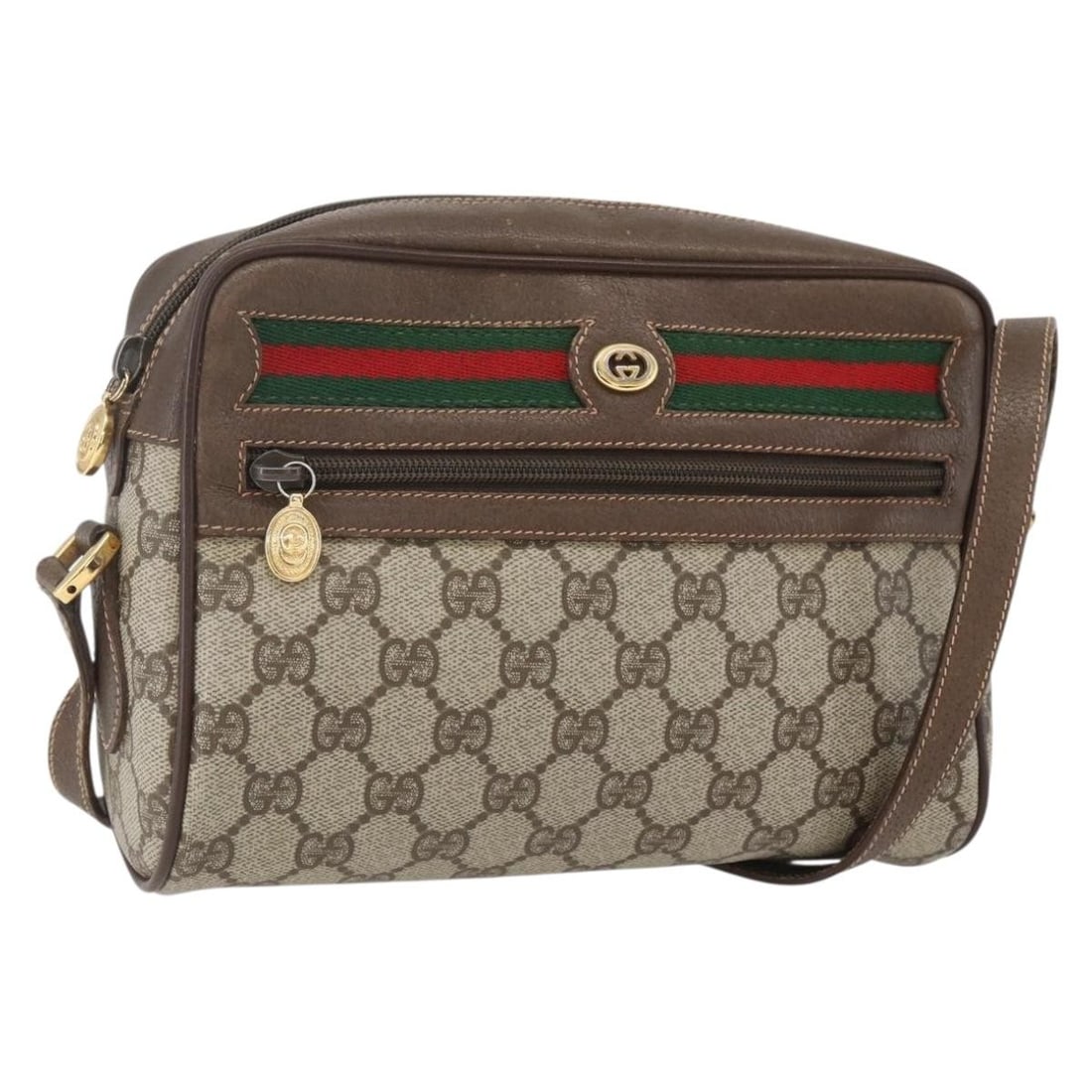 Beige GG Supreme Web Sherry Line Shoulder Bag by Gucci PVC 56 02 087: Beige GG Supreme Web Sherry Line Shoulder Bag by Gucci PVC 56 02 087 This is a Gucci GG Supreme Web Sherry Line shoulder bag crafted from beige PVC leather and GG canvas. Made in Italy, the bag featur