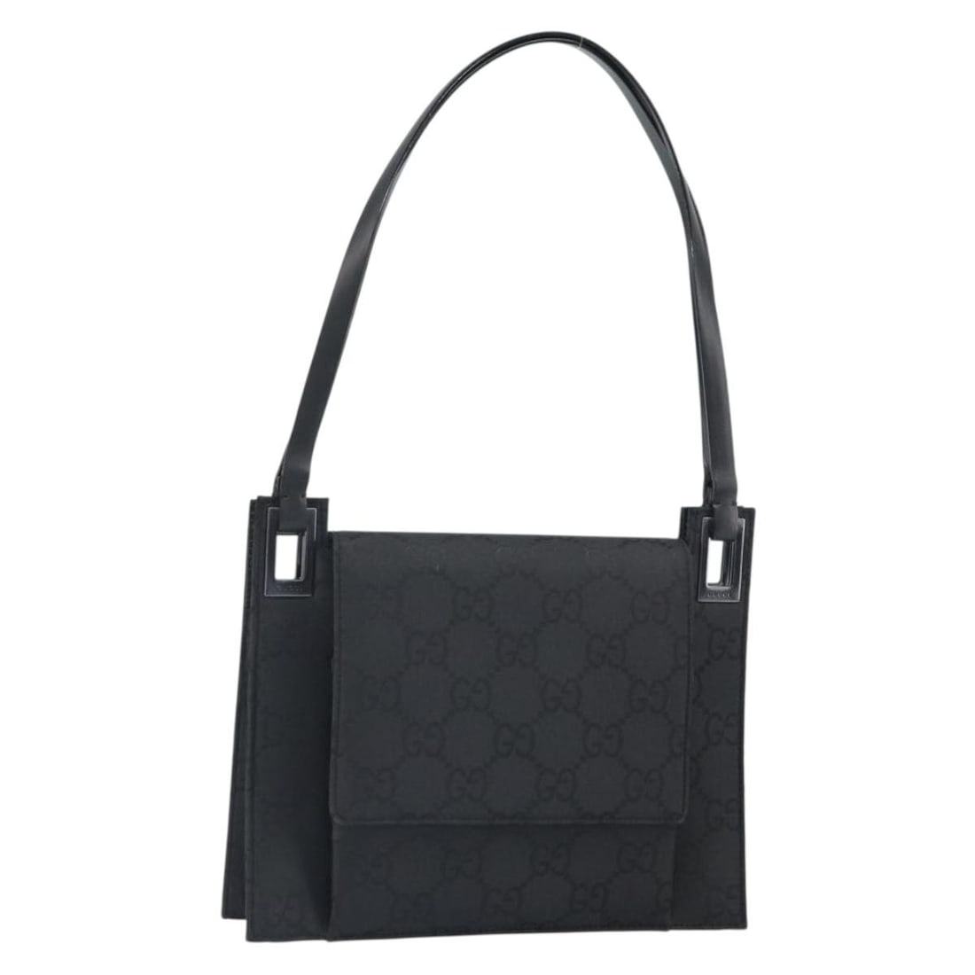 Black Nylon GG Canvas Shoulder Bag by Gucci Model 001 3068: Black Nylon GG Canvas Shoulder Bag by Gucci Model 001 3068 This is a GUCCI GG Canvas shoulder bag crafted from black and silver nylon with GG canvas detailing. Made in Italy, the bag features a compac
