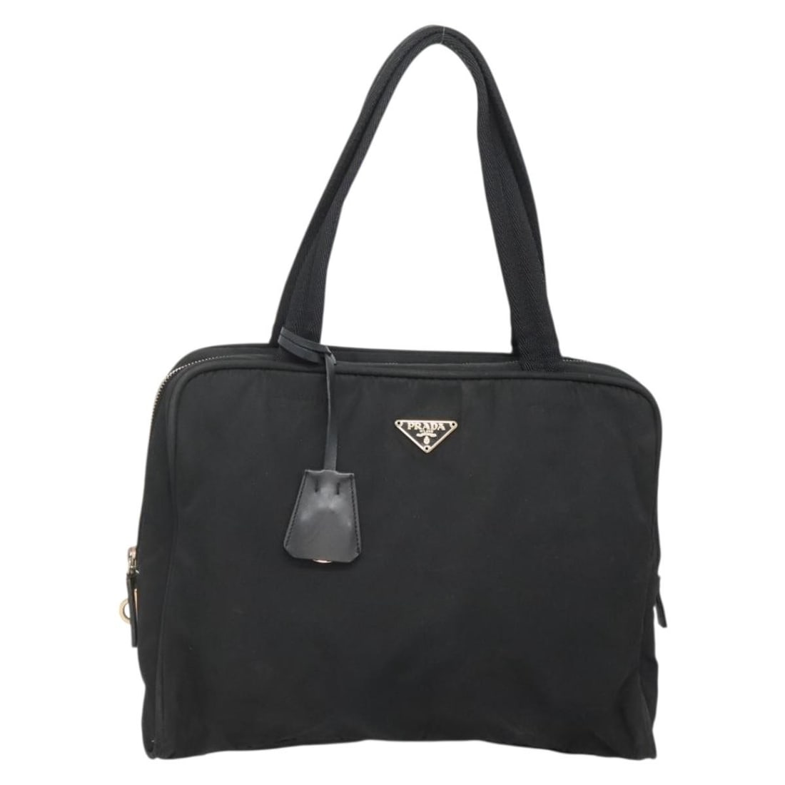 Black Nylon Prada Handbag with Gold Accents Made in Italy: Black Nylon Prada Handbag with Gold Accents Made in Italy This Prada handbag features a black nylon exterior with gold-tone accents. The bag is made in Italy and offers a practical design with a singl