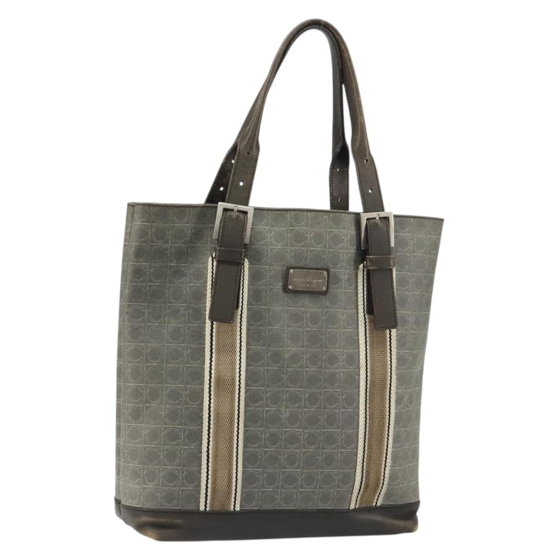 Salvatore Ferragamo Gancini Brown Leather Tote Bag with Pouch: Salvatore Ferragamo Gancini Brown Leather Tote Bag with Pouch This Salvatore Ferragamo Gancini Tote Bag is a luxurious accessory crafted in Italy from high-quality leather. The elegant brown and silve