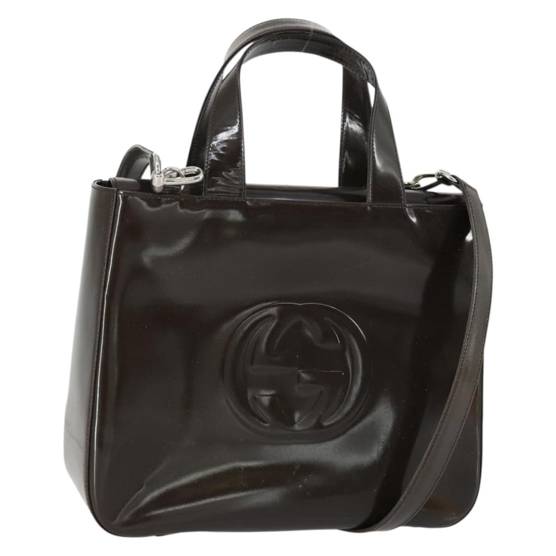 Gucci Brown Patent Leather 2way Handbag With Shoulder Strap Silver Accents: Gucci Brown Patent Leather 2way Handbag With Shoulder Strap Silver Accents This is a Gucci 2-way handbag crafted from brown and silver patent leather. The bag features both a top handle and a detachab