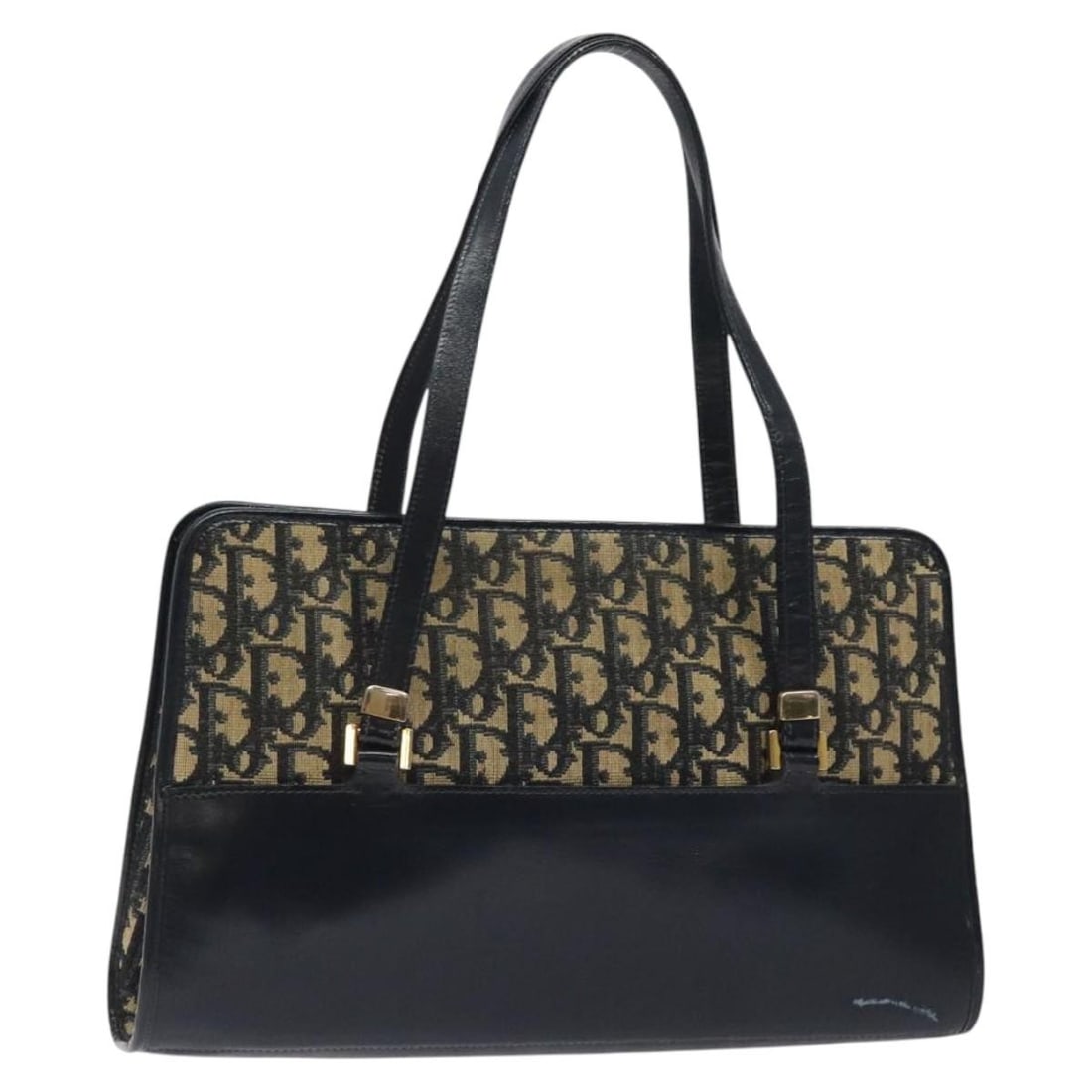 Christian Dior Navy Gold Trotter Canvas Hand Bag Authentic: Christian Dior Navy Gold Trotter Canvas Hand Bag Authentic This authentic Christian Dior Trotter Canvas Hand Bag showcases a stylish navy and gold color combination. Crafted from durable Trotter Canva