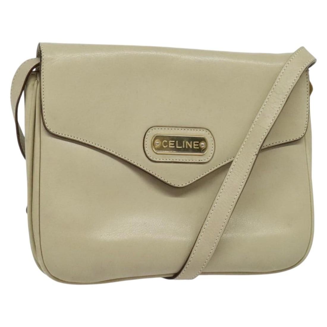CELINE Ivory Gold Leather Shoulder Bag Made in Italy Auth 138458: CELINE Ivory Gold Leather Shoulder Bag Made in Italy Auth 138458 This CELINE shoulder bag exemplifies luxury and style with its elegant ivory leather exterior accented by gold hardware. Designed for b