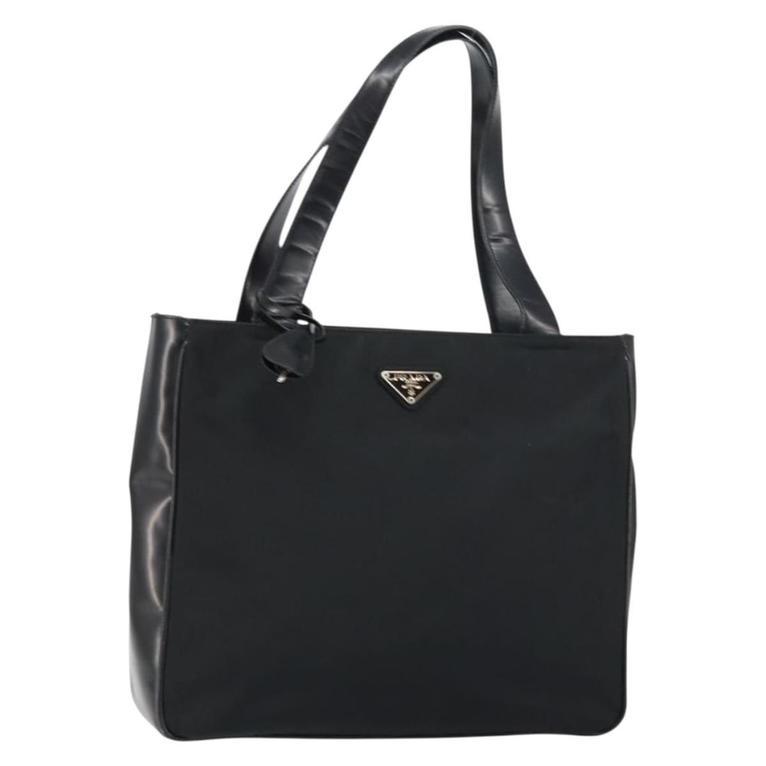Black Nylon Tote by Prada with Silver Enamel Details Italy: Black Nylon Tote by Prada with Silver Enamel Details Italy This PRADA tote bag features a black nylon exterior with silver-tone enamel accents. Made in Italy, it has a practical design with double han