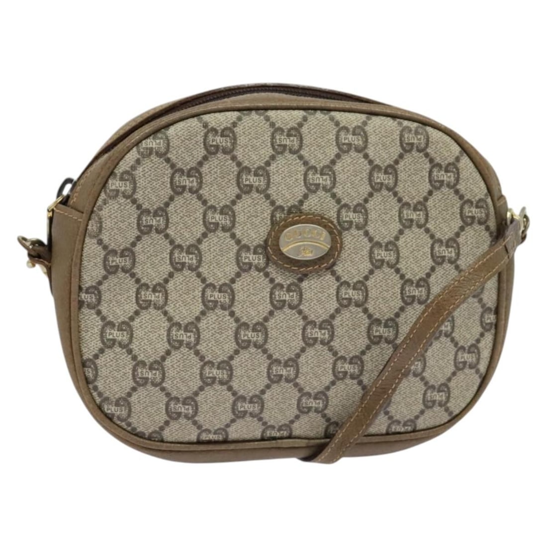 GUCCI GG Plus Supreme Beige Gold PVC Shoulder Bag Italy: GUCCI GG Plus Supreme Beige Gold PVC Shoulder Bag Italy This GUCCI GG Plus Supreme Shoulder Bag is a stylish accessory crafted from durable PVC leather, featuring a chic beige and gold color scheme. W
