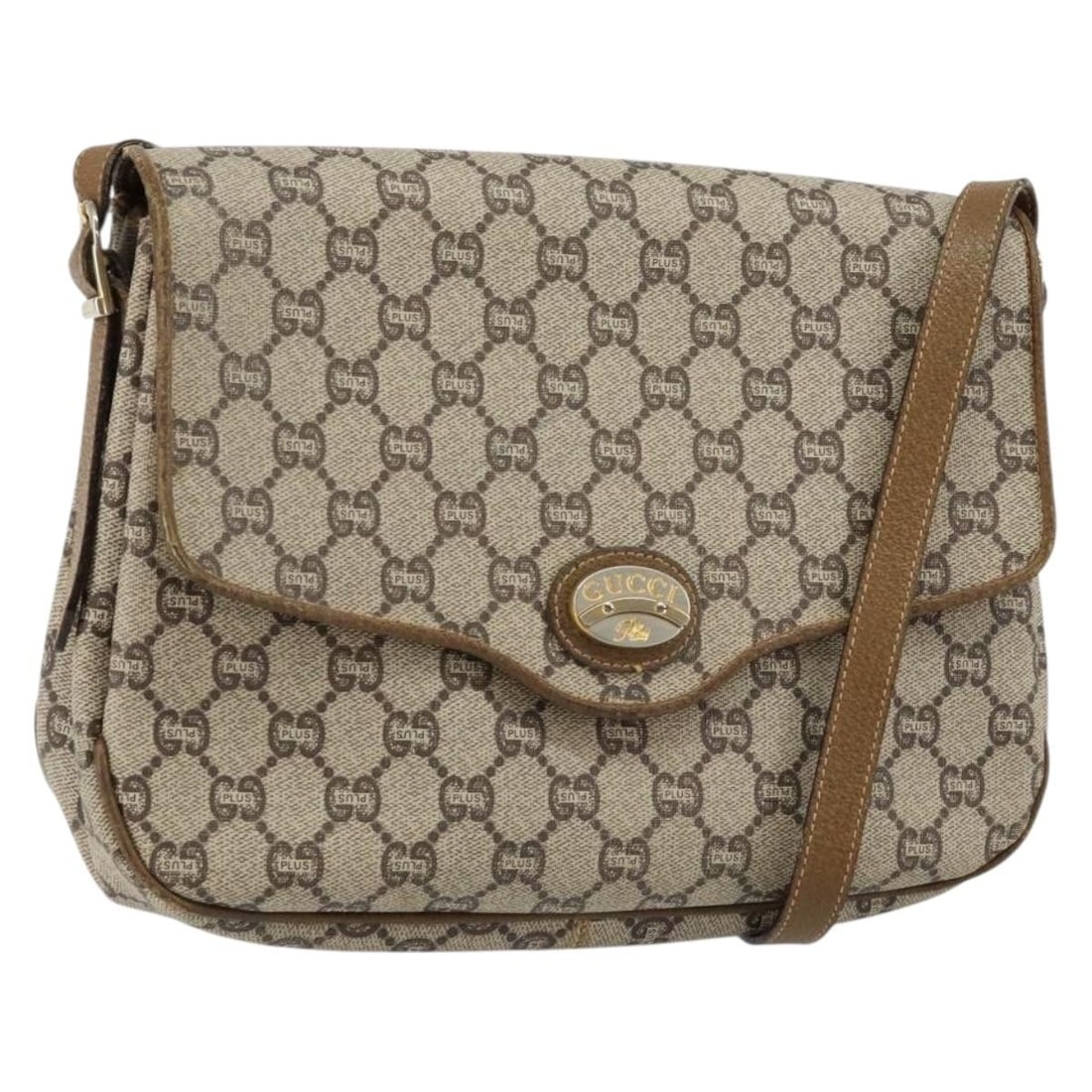 GUCCI GG PLUS Beige PVC Leather Shoulder Bag Made in Italy: GUCCI GG PLUS Beige PVC Leather Shoulder Bag Made in Italy This GUCCI GG PLUS Canvas Shoulder Bag is a stylish accessory crafted in Italy, featuring a combination of PVC leather and GG canvas in a sop