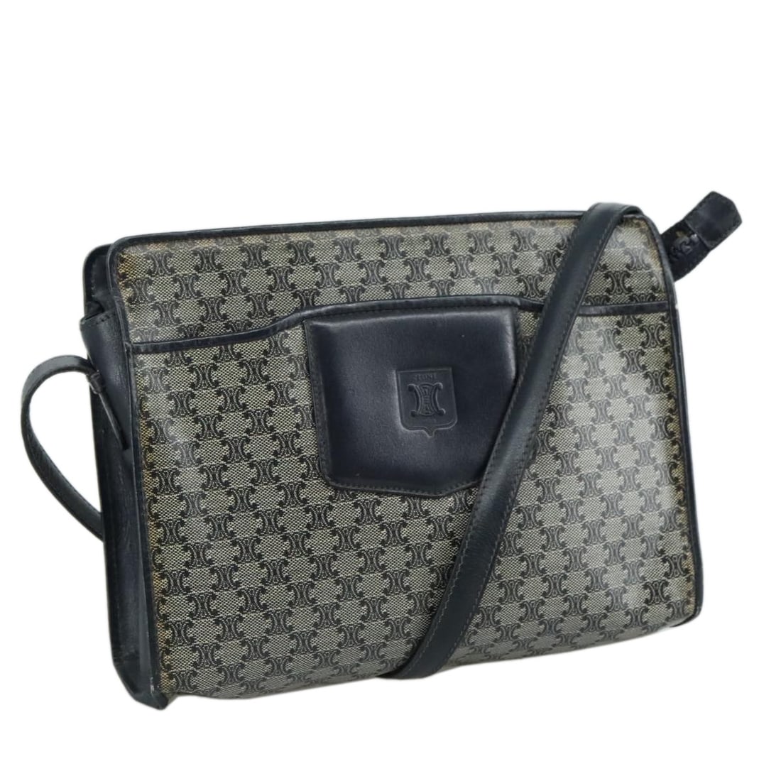 CELINE Navy Macadam Canvas Shoulder Bag Coated Canvas Italy: CELINE Navy Macadam Canvas Shoulder Bag Coated Canvas Italy This Celine Macadam Canvas Shoulder Bag is crafted from durable coated canvas in a rich navy color, making it a stylish and functional acces