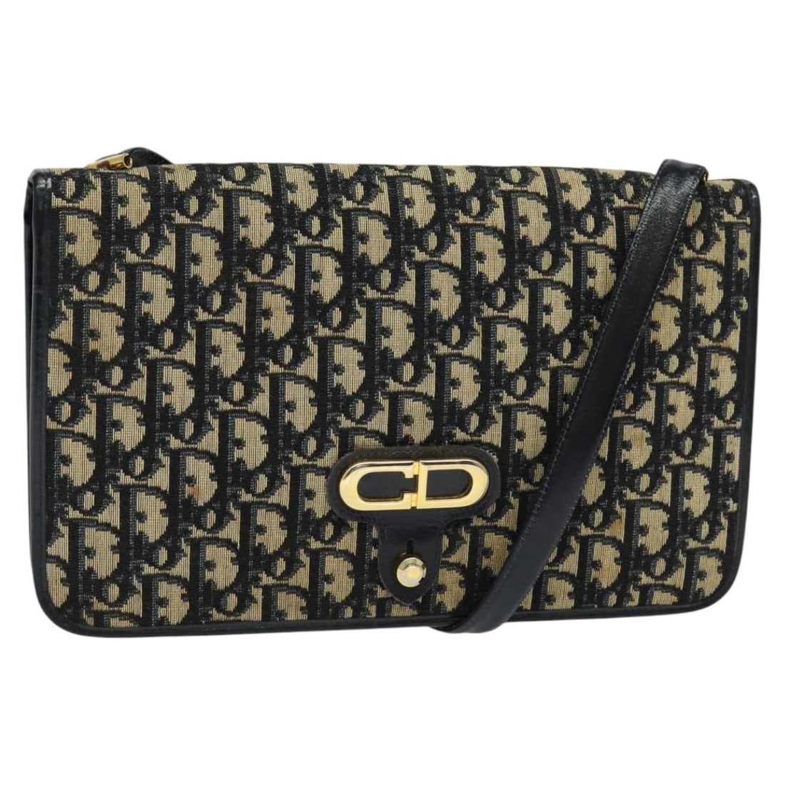 Christian Dior Navy Trotter Canvas Shoulder Bag Made in France: Christian Dior Navy Trotter Canvas Shoulder Bag Made in France This authentic Christian Dior Trotter Canvas Shoulder Bag in navy is a stylish accessory for everyday use. Crafted from durable Trotter c