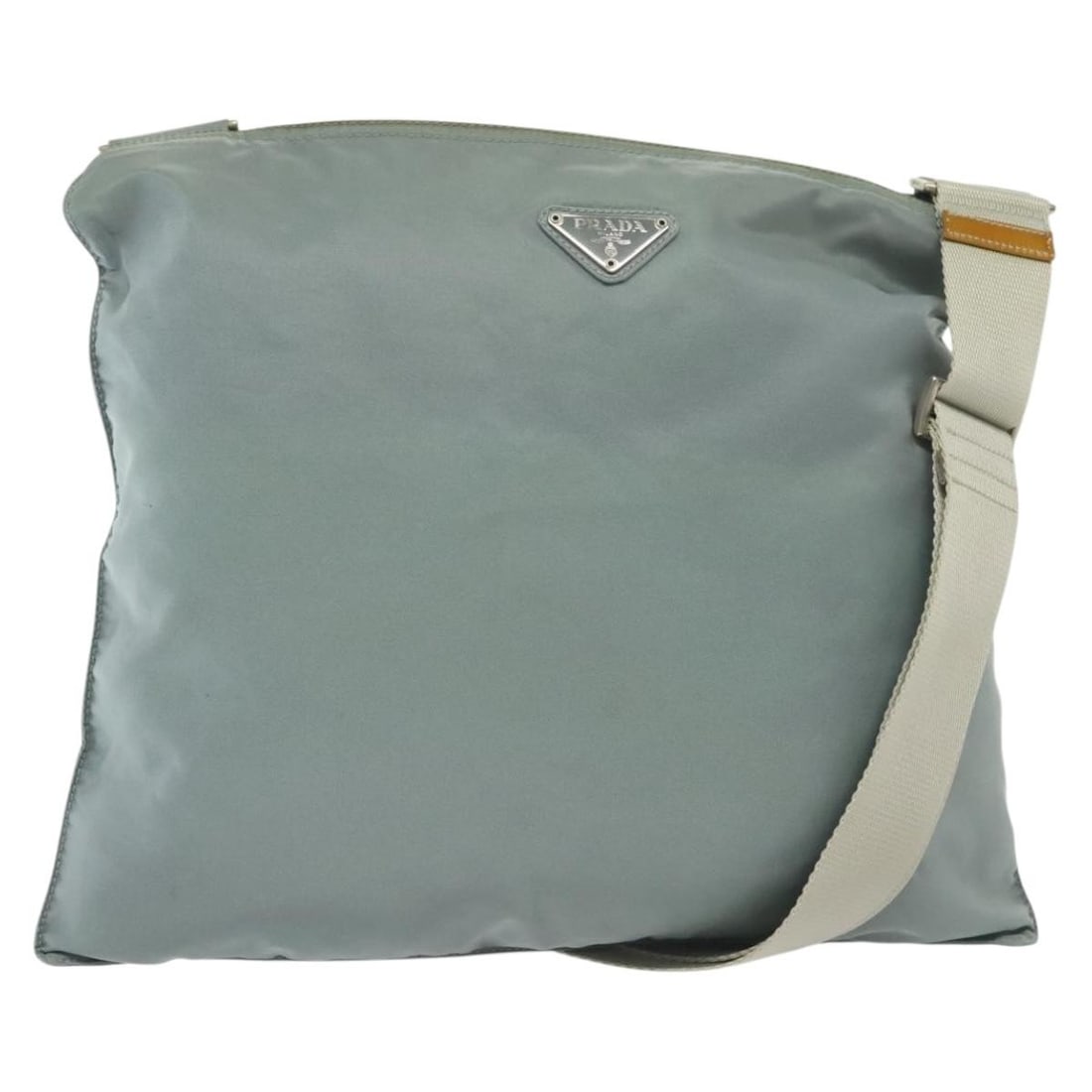 PRADA Light Blue Silver Nylon Shoulder Bag Made in Italy: PRADA Light Blue Silver Nylon Shoulder Bag Made in Italy This authentic PRADA shoulder bag showcases a stylish light blue and silver nylon exterior, perfect for adding a pop of color to your outfit. M