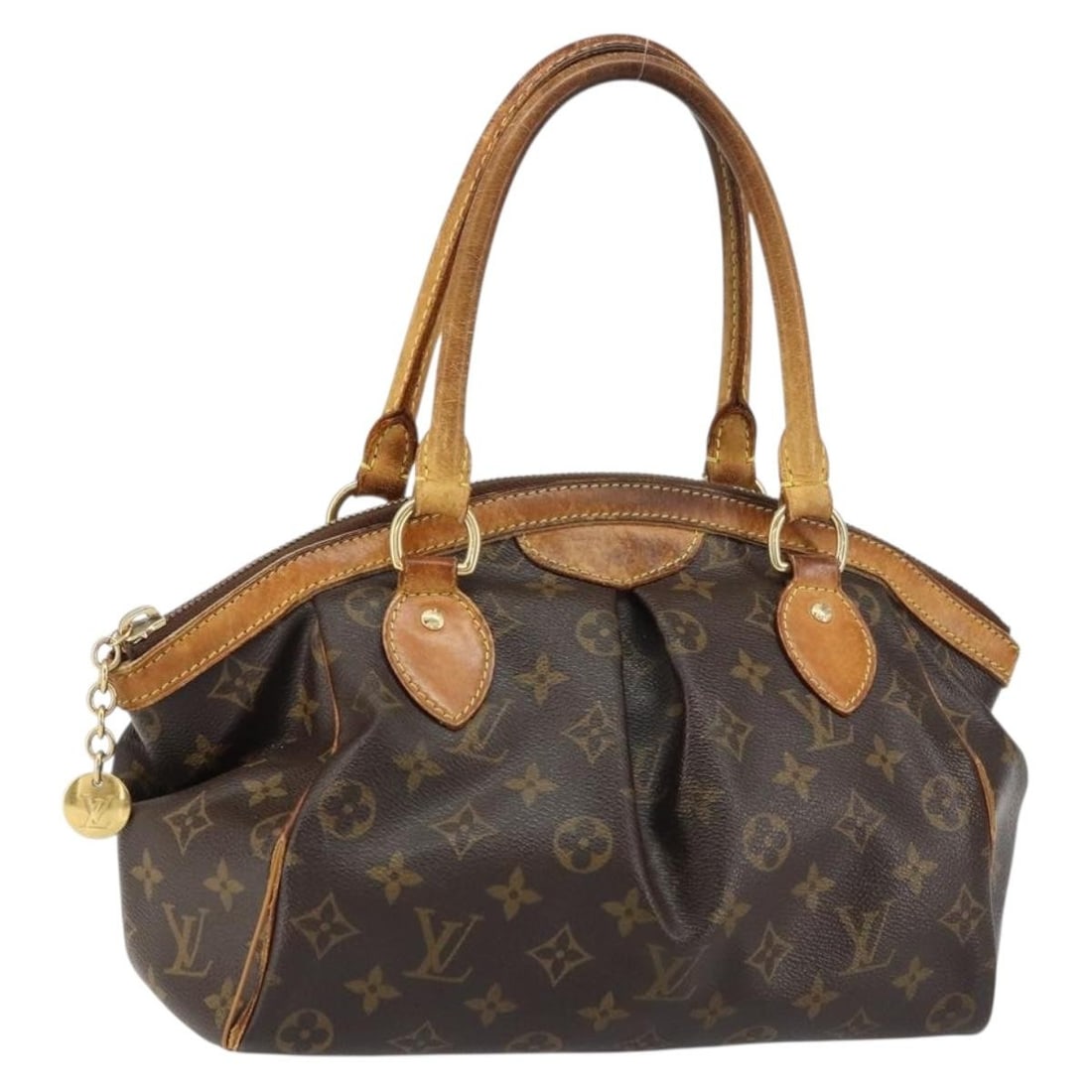 Louis Vuitton Tivoli PM Monogram Canvas Handbag M40143 France: Louis Vuitton Tivoli PM Monogram Canvas Handbag M40143 France This Louis Vuitton Monogram Tivoli PM handbag features the iconic monogram canvas and is crafted in France. The bag measures approximately