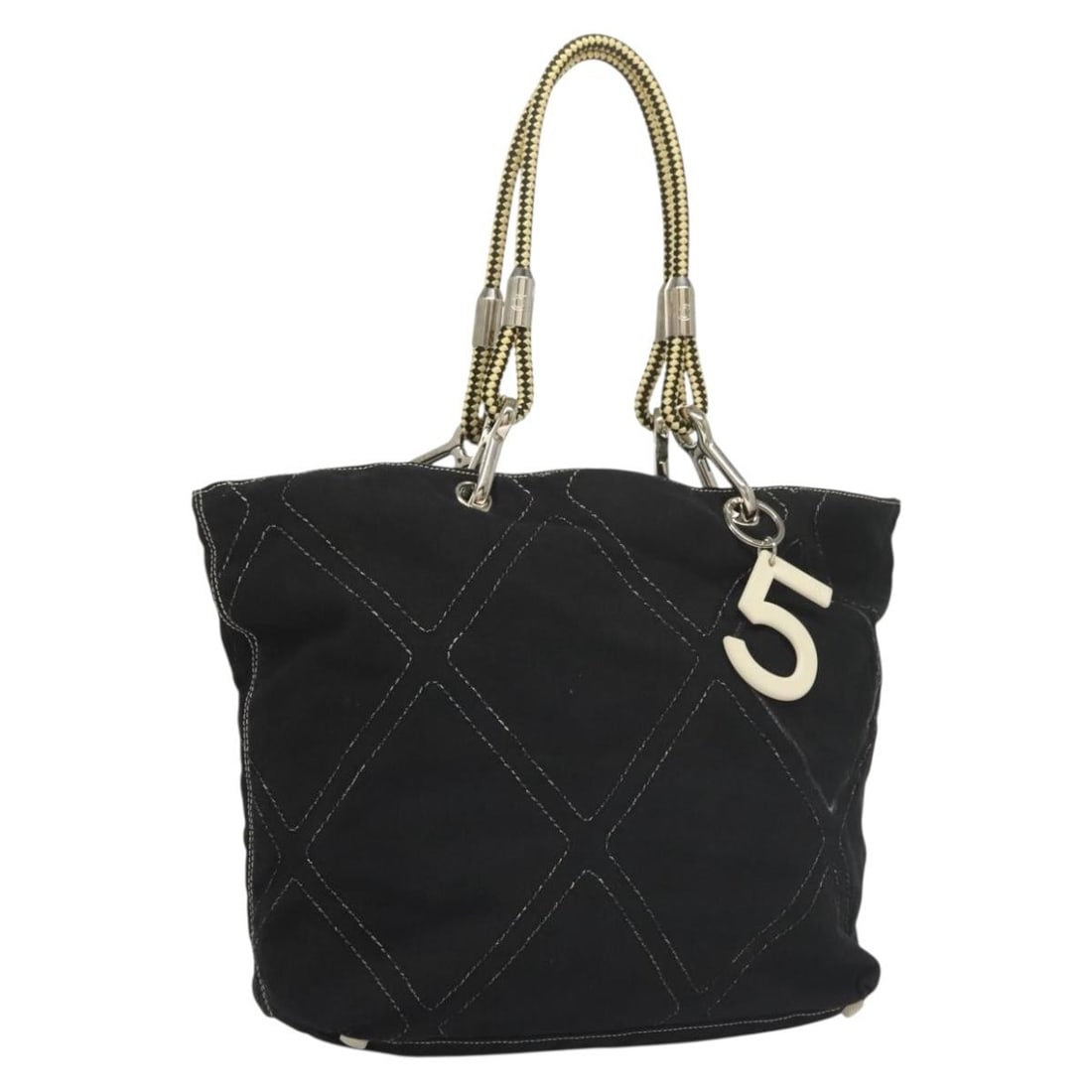CHANEL Black Silver Canvas Tote Bag Auth BA4041: CHANEL Black Silver Canvas Tote Bag Auth BA4041 Introducing a stylish CHANEL Tote Bag crafted from durable canvas in a striking black and silver color scheme. This tote is perfect for everyday use, of