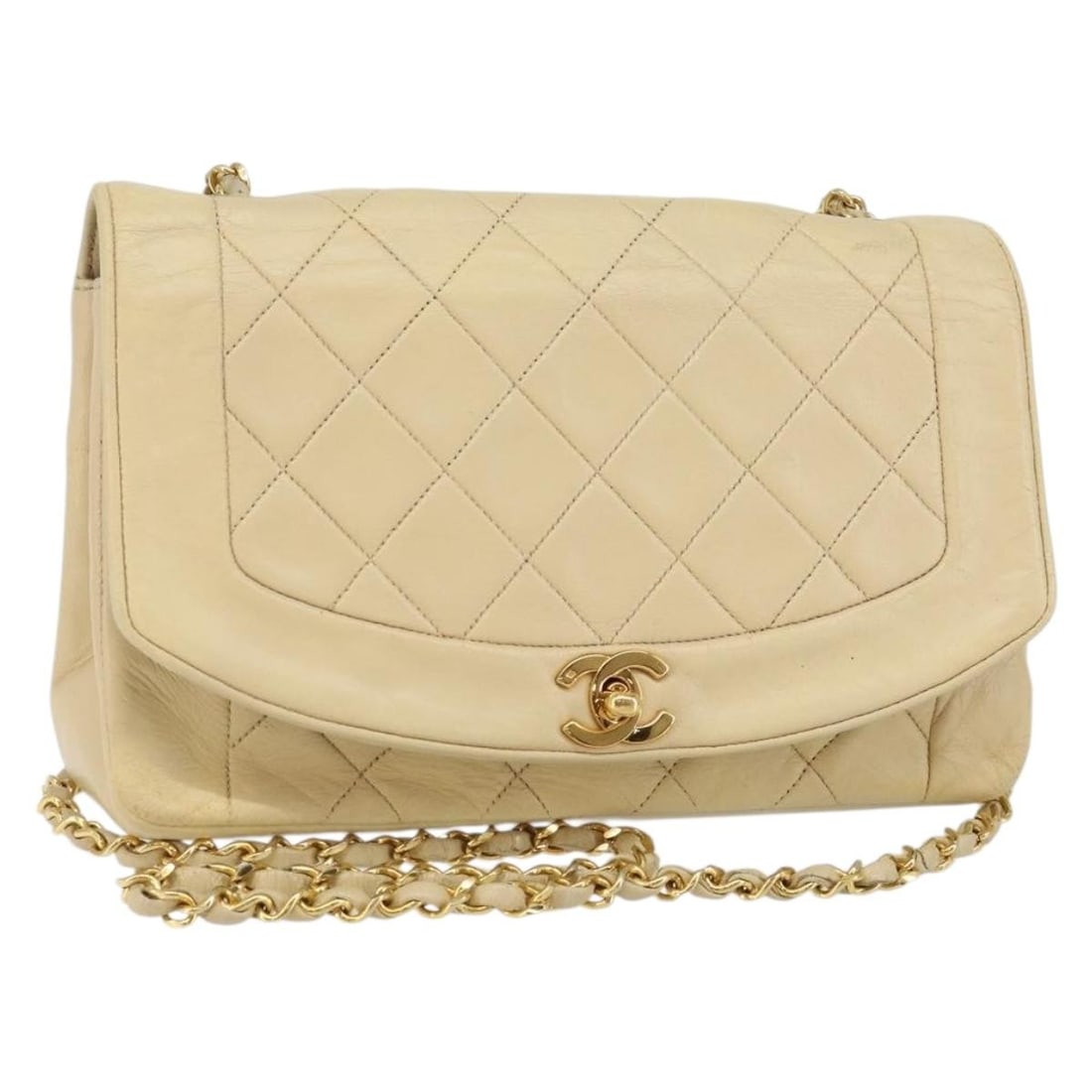 Beige Diana Flap Shoulder Bag by Chanel Vintage: Beige Diana Flap Shoulder Bag by Chanel Vintage This pre-owned Chanel Matelasse Diana shoulder bag features a beige finish and classic chain strap design. It is in fair condition, with notable signs o