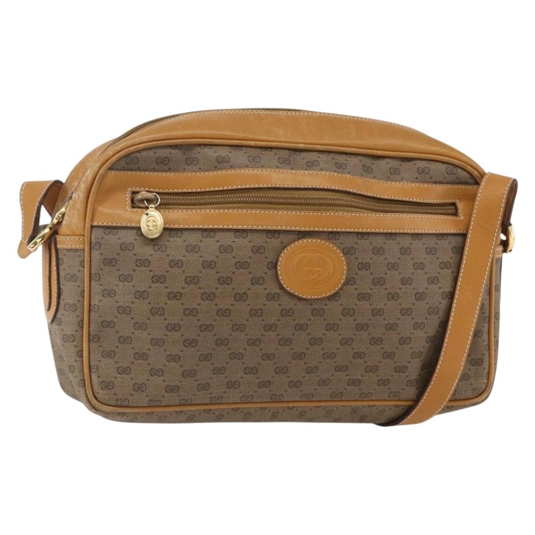 Beige and Gold Micro GG Supreme Shoulder Purse by Gucci in PVC Leather: Beige and Gold Micro GG Supreme Shoulder Purse by Gucci in PVC Leather This GUCCI Micro GG Supreme shoulder bag is crafted from beige and gold PVC leather with Micro GG canvas detailing. Designed as a