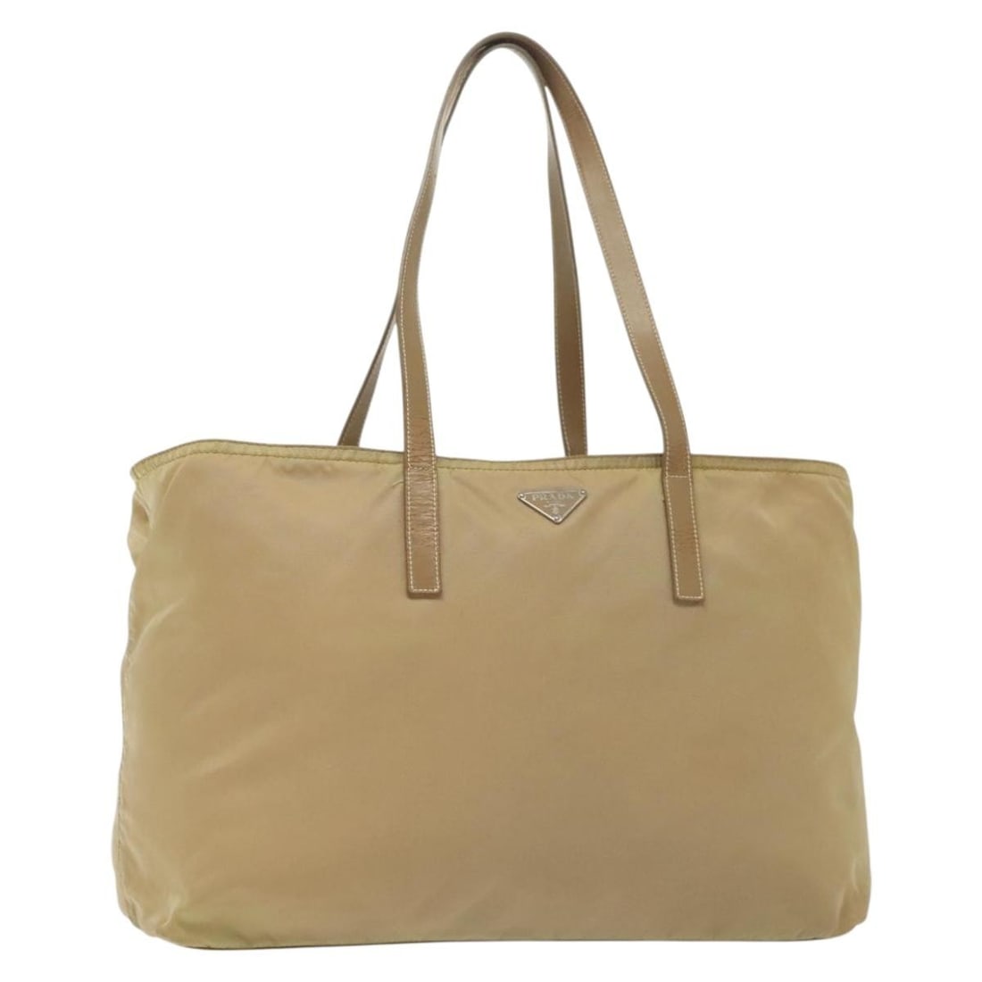 PRADA Beige Silver Nylon Tote Bag Made in Italy Auth 140315: PRADA Beige Silver Nylon Tote Bag Made in Italy Auth 140315 This authentic PRADA tote bag combines style and functionality, crafted from durable nylon in a chic beige and silver color scheme. Ideal fo