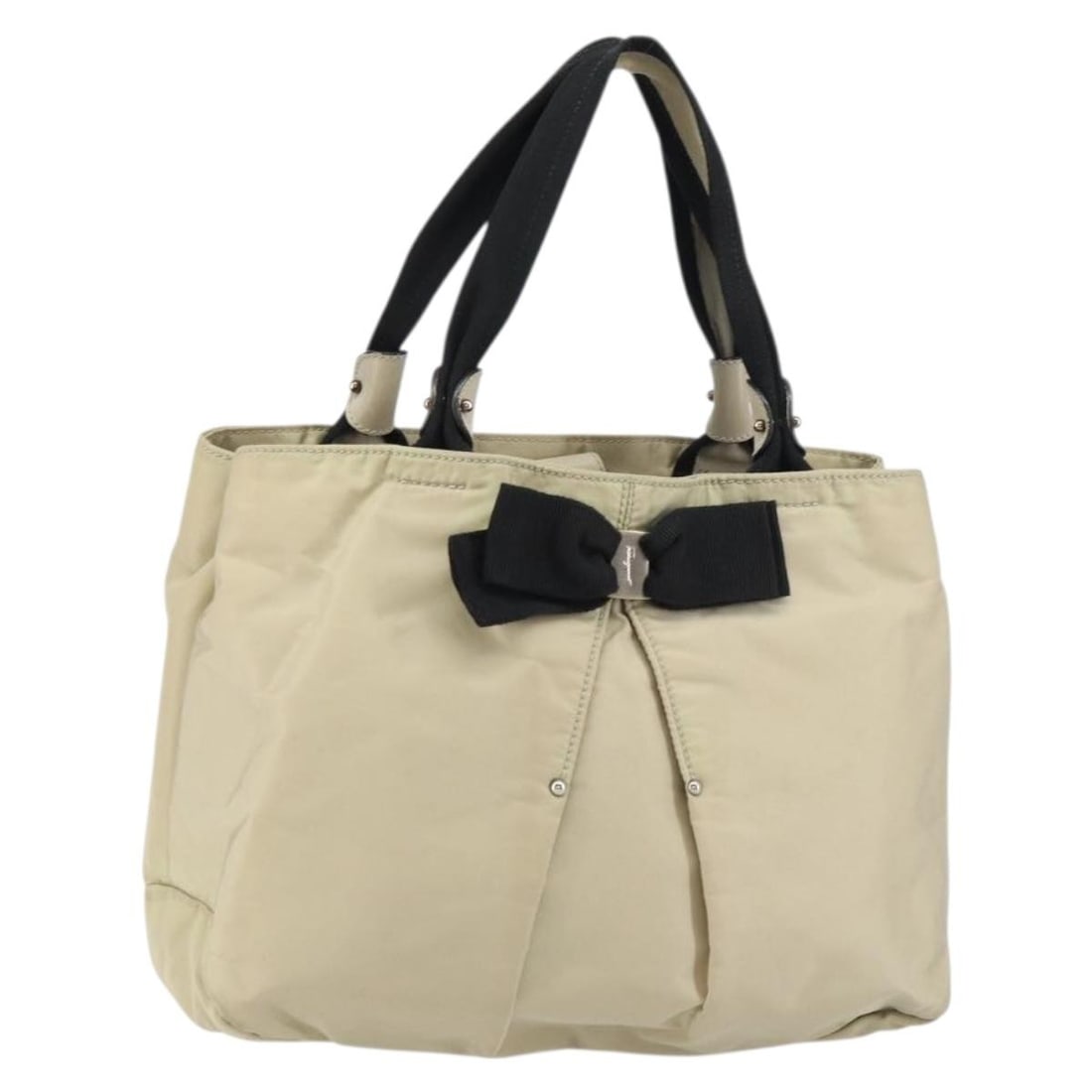 Beige Nylon Salvatore Ferragamo Vala Handbag with Silver Accents Italy: Beige Nylon Salvatore Ferragamo Vala Handbag with Silver Accents Italy This Salvatore Ferragamo Vala handbag is crafted from beige and silver nylon and features silver-tone metal accents. Made in Ital