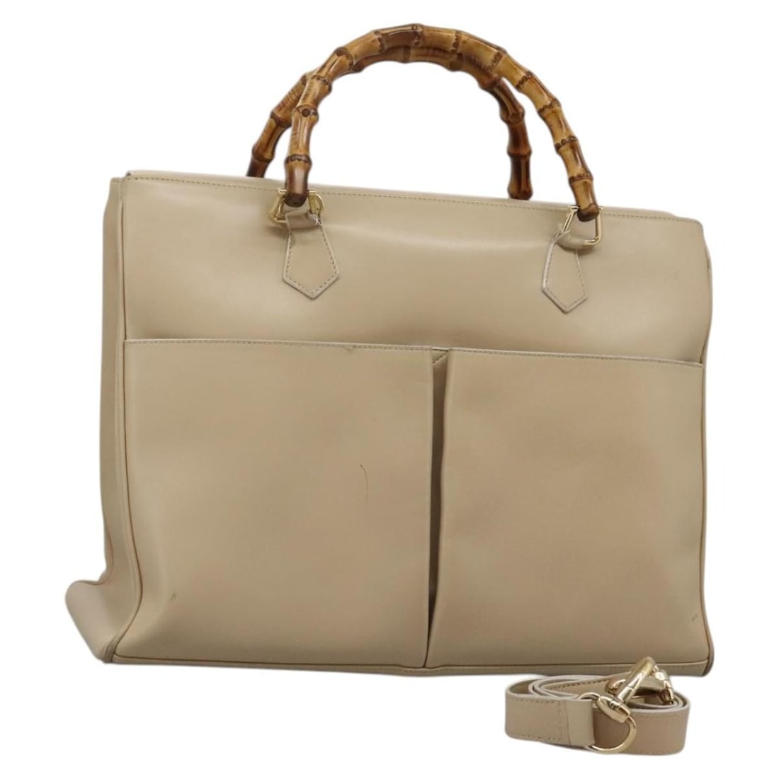 GUCCI Bamboo Hand Bag Leather Beige Gold 002 2855 0322 0 Authentic: GUCCI Bamboo Hand Bag Leather Beige Gold 002 2855 0322 0 Authentic This authentic GUCCI Bamboo Hand Bag combines elegance and functionality with its luxurious beige and gold leather exterior. Designed