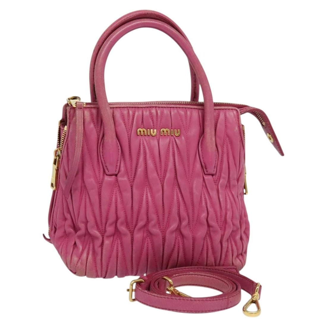 Miu Miu Pink Gold Matelasse Leather Hand Bag with Shoulder Strap Auth 120662: Miu Miu Pink Gold Matelasse Leather Hand Bag with Shoulder Strap Auth 120662 This elegant Miu Miu Matelasse Hand Bag is crafted from high-quality leather in a delightful pink and gold color combinatio