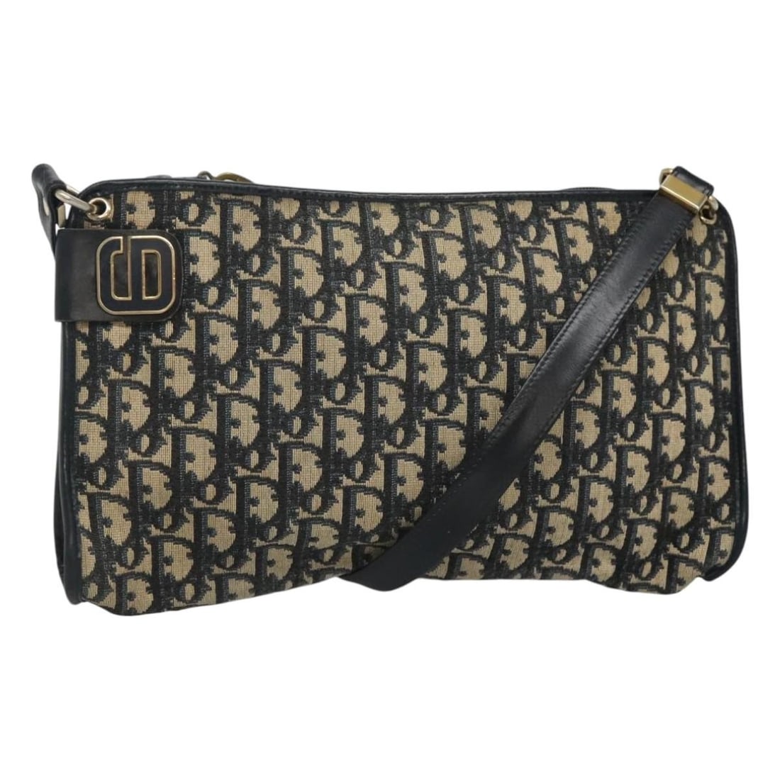 Navy Trotter Canvas Christian Dior Shoulder Bag from France: Navy Trotter Canvas Christian Dior Shoulder Bag from France This is a Christian Dior Trotter Canvas shoulder bag in navy, crafted in France. The bag features the signature Trotter canvas exterior and