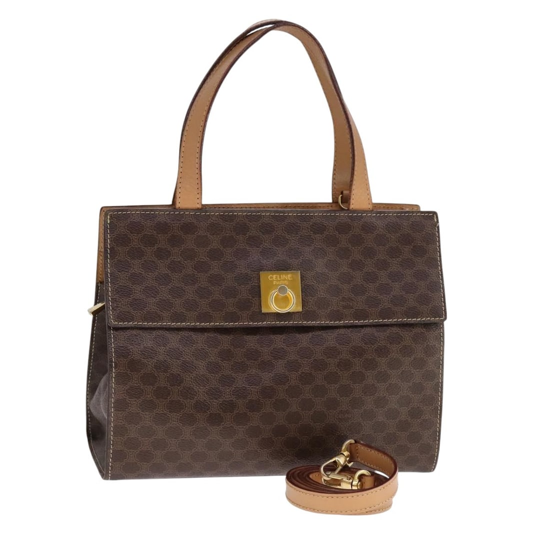 Brown Celine Macadam Canvas PVC Leather Handbag with Shoulder Strap: Brown Celine Macadam Canvas PVC Leather Handbag with Shoulder Strap This CELINE Macadam Canvas hand bag features a brown PVC leather and canvas exterior, offering a versatile 2-way style with both han