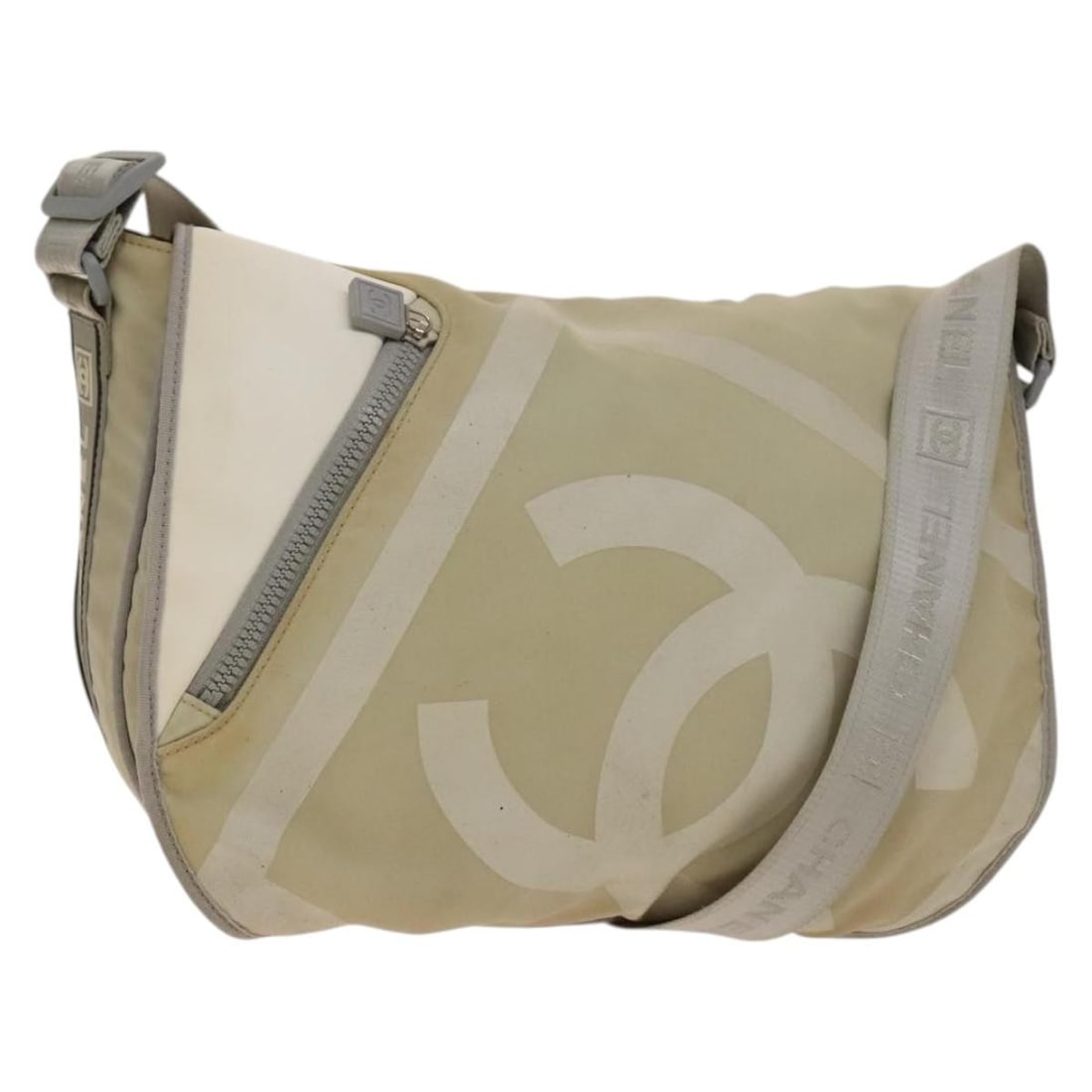 CHANEL Beige Silver Nylon Sports Boston Bag Authentic Italy: CHANEL Beige Silver Nylon Sports Boston Bag Authentic Italy This authentic CHANEL Sports Boston Bag showcases a chic and functional design, crafted from durable nylon in a stylish beige and silver col
