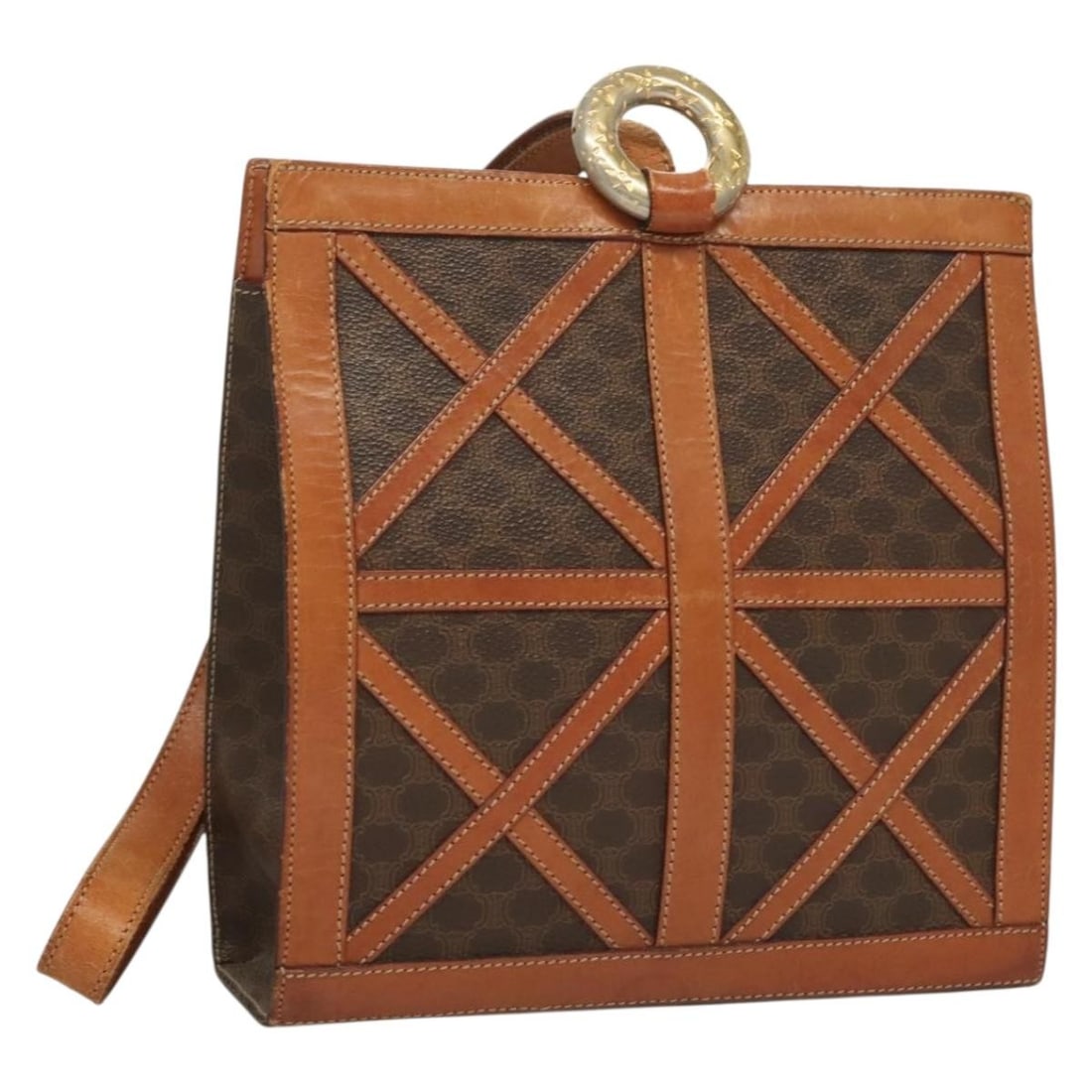 CELINE Brown Gold PVC Leather Macadam Shoulder Bag Auth 131477: CELINE Brown Gold PVC Leather Macadam Shoulder Bag Auth 131477 This CELINE Macadam Canvas Shoulder Bag showcases a stylish blend of PVC leather and Macadam canvas in a rich brown and gold color scheme