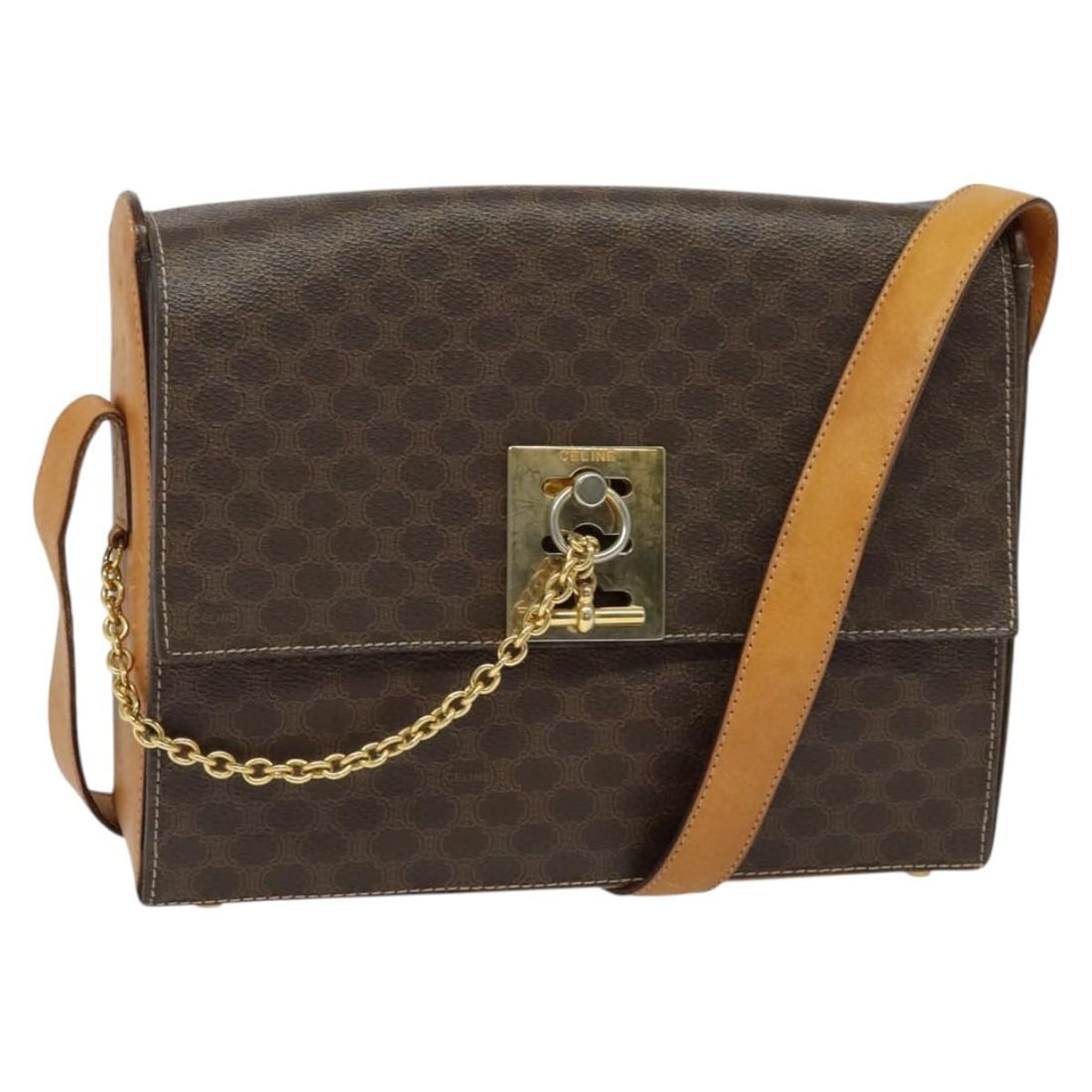 CELINE Macadam Canvas Shoulder Bag PVC Leather Brown Gold Made in Italy: CELINE Macadam Canvas Shoulder Bag PVC Leather Brown Gold Made in Italy This CELINE Macadam Canvas Shoulder Bag is a stylish accessory crafted from durable PVC leather with a sophisticated brown and g