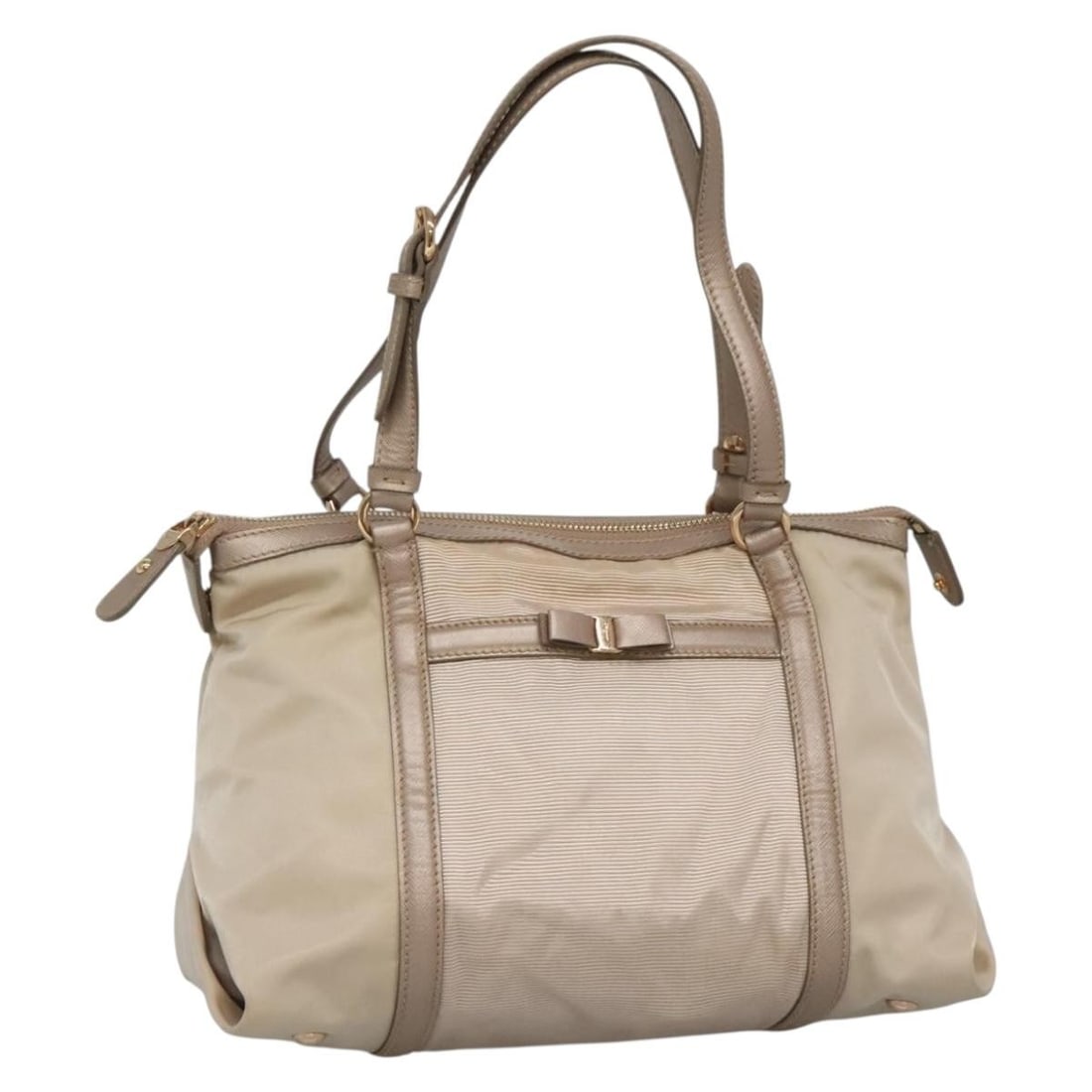 Salvatore Ferragamo Vala Beige Gold Nylon Hand Bag Auth BA5017: Salvatore Ferragamo Vala Beige Gold Nylon Hand Bag Auth BA5017 This Salvatore Ferragamo Vala Hand Bag is a stylish accessory crafted from durable nylon in a sophisticated beige and gold color combinat