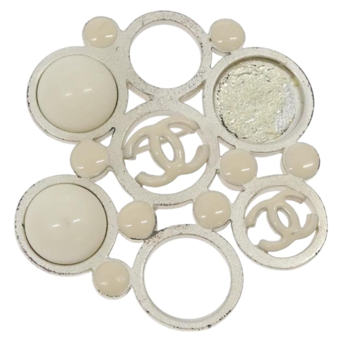 CHANEL White Metal Brooch Authentic France 50mm: CHANEL White Metal Brooch Authentic France 50mm This exquisite CHANEL brooch showcases a classic metal design in a striking white color. Made in France, this brooch is an elegant accessory suitable fo