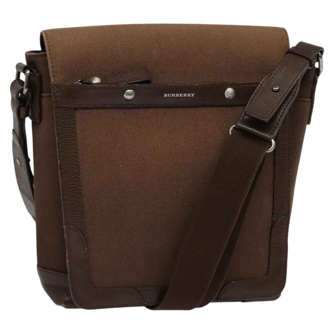 Burberry Brown Silver Canvas Shoulder Bag Authentic: Burberry Brown Silver Canvas Shoulder Bag Authentic This Burberry shoulder bag is crafted from durable canvas in a stylish brown and silver color combination. With approximate dimensions of 8.7 inches