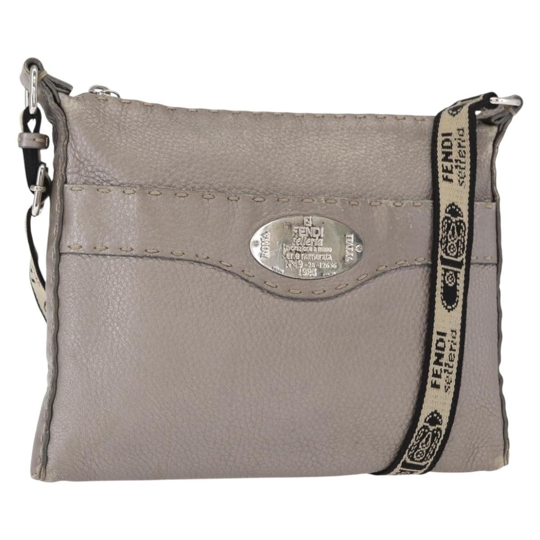 FENDI Celeria Silver Leather Shoulder Bag Auth BA8920 Italy: FENDI Celeria Silver Leather Shoulder Bag Auth BA8920 Italy This Fendi Celeria Shoulder Bag is a luxurious accessory crafted from high-quality leather in a stunning silver hue. Measuring approximately