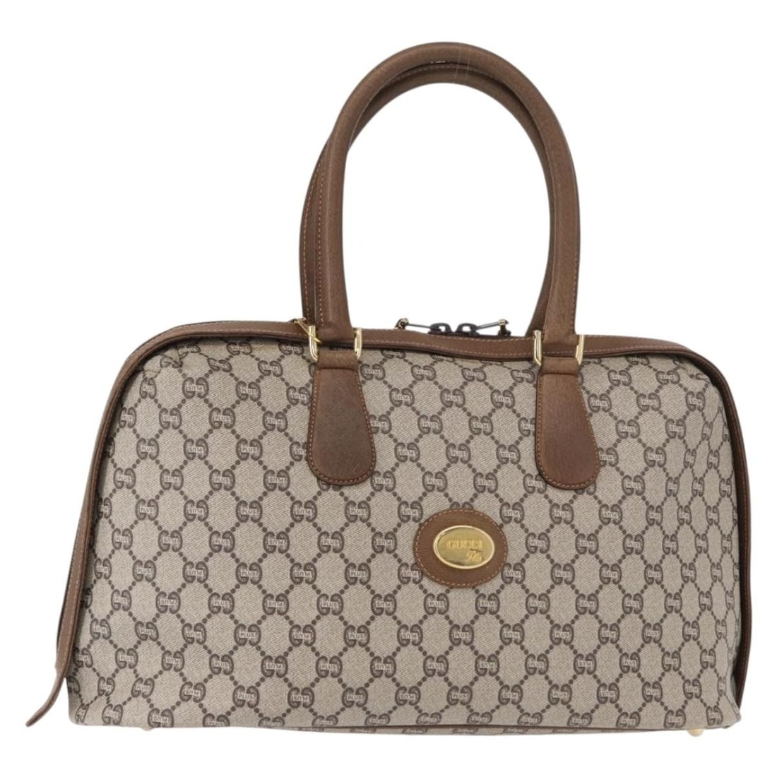 GUCCI GG Plus Supreme Beige Gold PVC Boston Bag Authentic: GUCCI GG Plus Supreme Beige Gold PVC Boston Bag Authentic This authentic GUCCI GG Plus Supreme Boston Bag is a stylish accessory crafted in Italy from durable PVC leather and GG canvas. Its elegant be