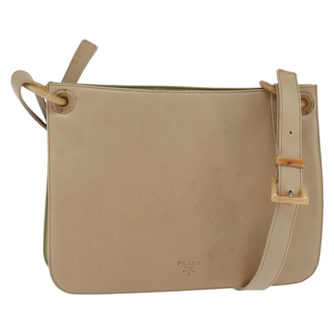 PRADA Beige Leather Shoulder Bag Made in Italy: PRADA Beige Leather Shoulder Bag Made in Italy This authentic PRADA shoulder bag is crafted from high-quality leather in a sophisticated beige shade. Made in Italy, this bag showcases a stylish design