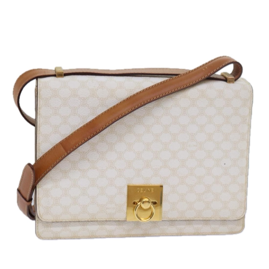 CELINE White PVC Macadam Canvas Shoulder Bag Made in Italy: CELINE White PVC Macadam Canvas Shoulder Bag Made in Italy This stylish CELINE Macadam Canvas Shoulder Bag is crafted from durable PVC leather, featuring a chic white exterior that complements any out