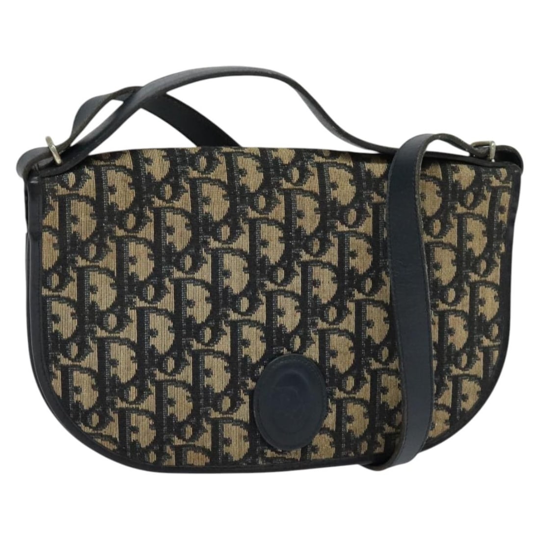 Christian Dior Navy Trotter Canvas Shoulder Bag Made in France: Christian Dior Navy Trotter Canvas Shoulder Bag Made in France This Christian Dior Trotter Canvas Shoulder Bag in navy is a stylish accessory with a classic appeal. Crafted from durable Trotter canvas