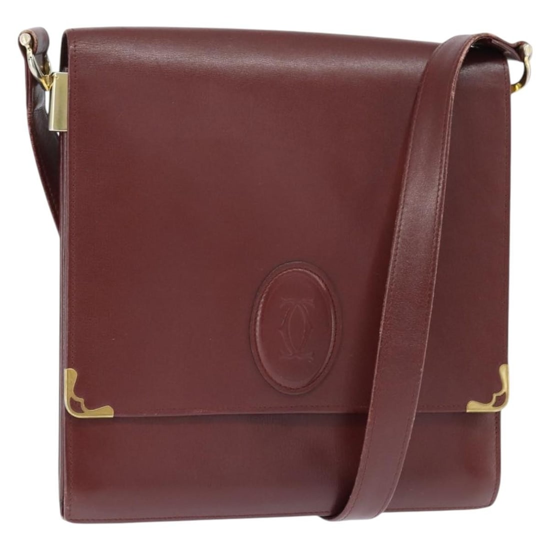 CARTIER Must Line Bordeaux Gold Leather Shoulder Bag: CARTIER Must Line Bordeaux Gold Leather Shoulder Bag This CARTIER Must Line Shoulder Bag is a stylish accessory crafted from luxurious leather in an elegant bordeaux and gold color combination. The ba
