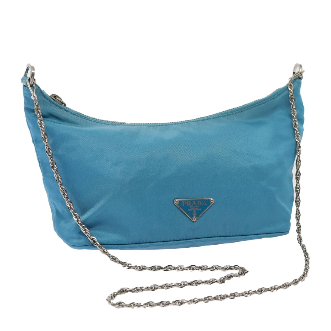Authentic PRADA Light Blue Nylon Chain Shoulder Bag Made in Italy: Authentic PRADA Light Blue Nylon Chain Shoulder Bag Made in Italy This PRADA Chain Shoulder Bag is crafted from durable nylon in a refreshing light blue hue, perfect for adding a touch of elegance to