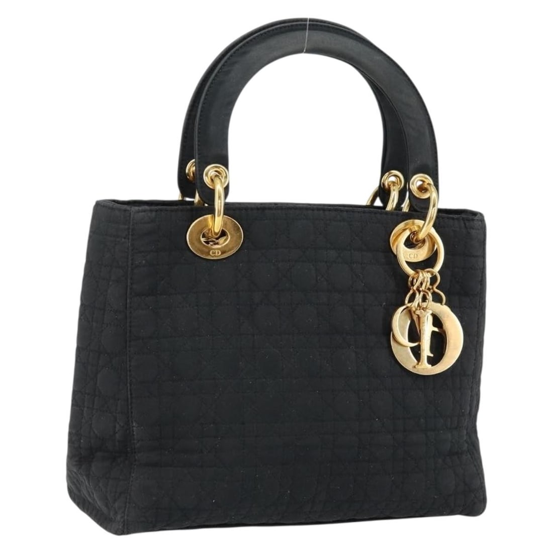 Christian Dior Black Gold Nylon Canage Hand Bag Authentic: Christian Dior Black Gold Nylon Canage Hand Bag Authentic This Christian Dior Canage Hand Bag combines elegant design with practical functionality. Crafted in Italy, this stylish handbag features a so