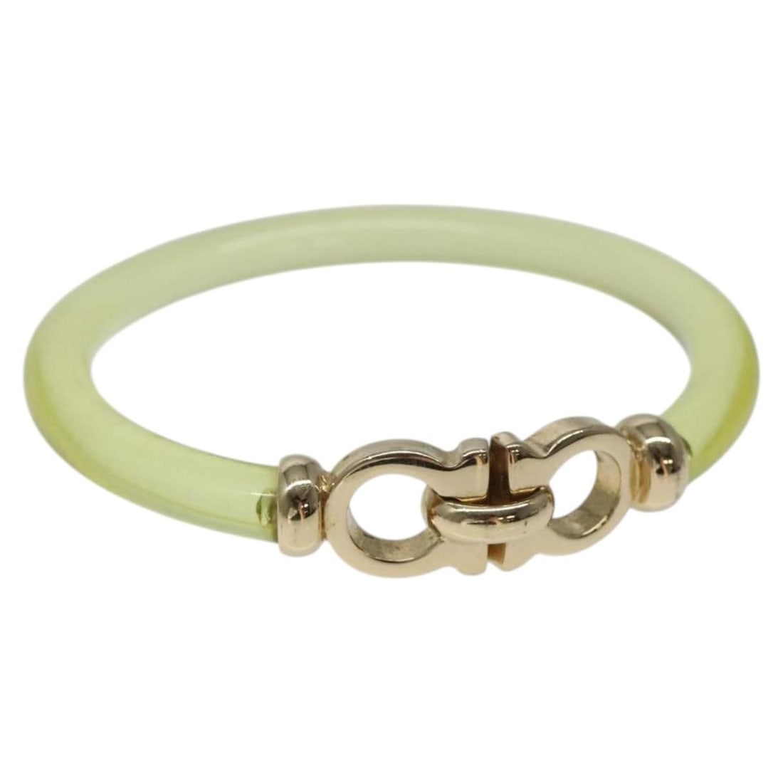 Salvatore Ferragamo Yellow Gancini Bracelet Plastic Authentic: Salvatore Ferragamo Yellow Gancini Bracelet Plastic Authentic This Salvatore Ferragamo Gancini Bracelet showcases a vibrant yellow color crafted from durable plastic. Designed in Italy, this stylish b