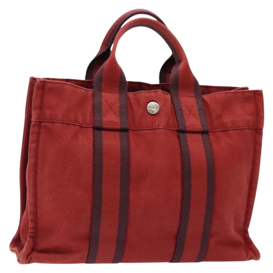 HERMES Fourre Tout PM Wine Red Canvas Tote Bag Made in France: HERMES Fourre Tout PM Wine Red Canvas Tote Bag Made in France This HERMES Fourre Tout PM Tote Bag is crafted from durable canvas and showcases a stunning wine red exterior. Designed in France, this ve