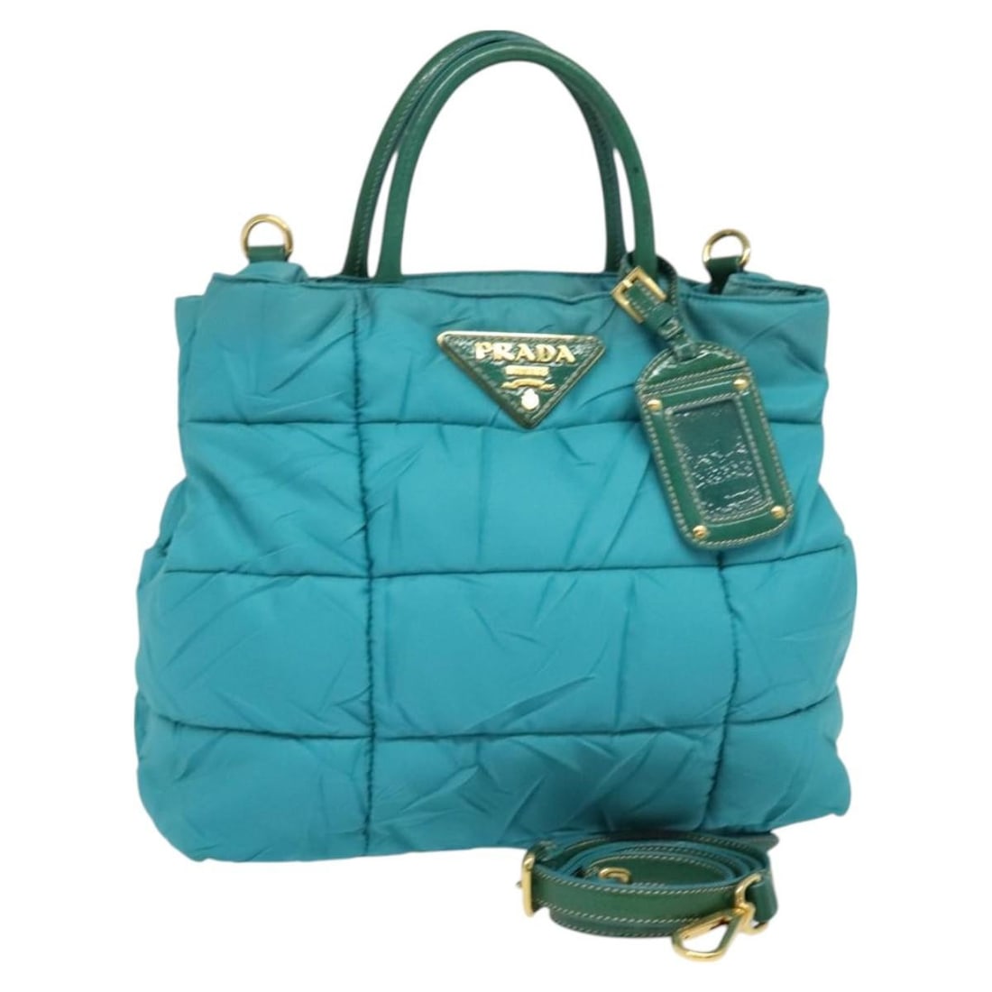 Authentic PRADA 2-Way Hand Bag Green Gold Nylon Made in Italy: Authentic PRADA 2-Way Hand Bag Green Gold Nylon Made in Italy This PRADA Hand Bag combines stylish design with functional utility. Crafted from durable nylon, it features a chic green and gold exterio