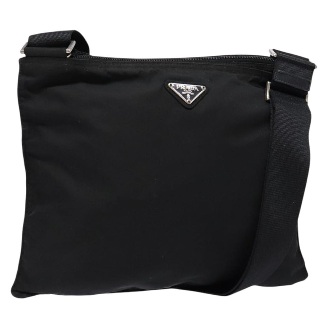 PRADA Black Silver Nylon Shoulder Bag Made in Italy Auth AR13740: PRADA Black Silver Nylon Shoulder Bag Made in Italy Auth AR13740 This elegant PRADA shoulder bag is crafted from durable nylon in a sleek black and silver color combination. With a bag height of appro