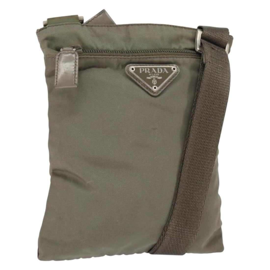 PRADA Khaki Silver Nylon Shoulder Bag Authentic Italy 146984: PRADA Khaki Silver Nylon Shoulder Bag Authentic Italy 146984 This authentic PRADA shoulder bag showcases a stylish blend of khaki and silver nylon, perfect for everyday use. Designed with functionalit