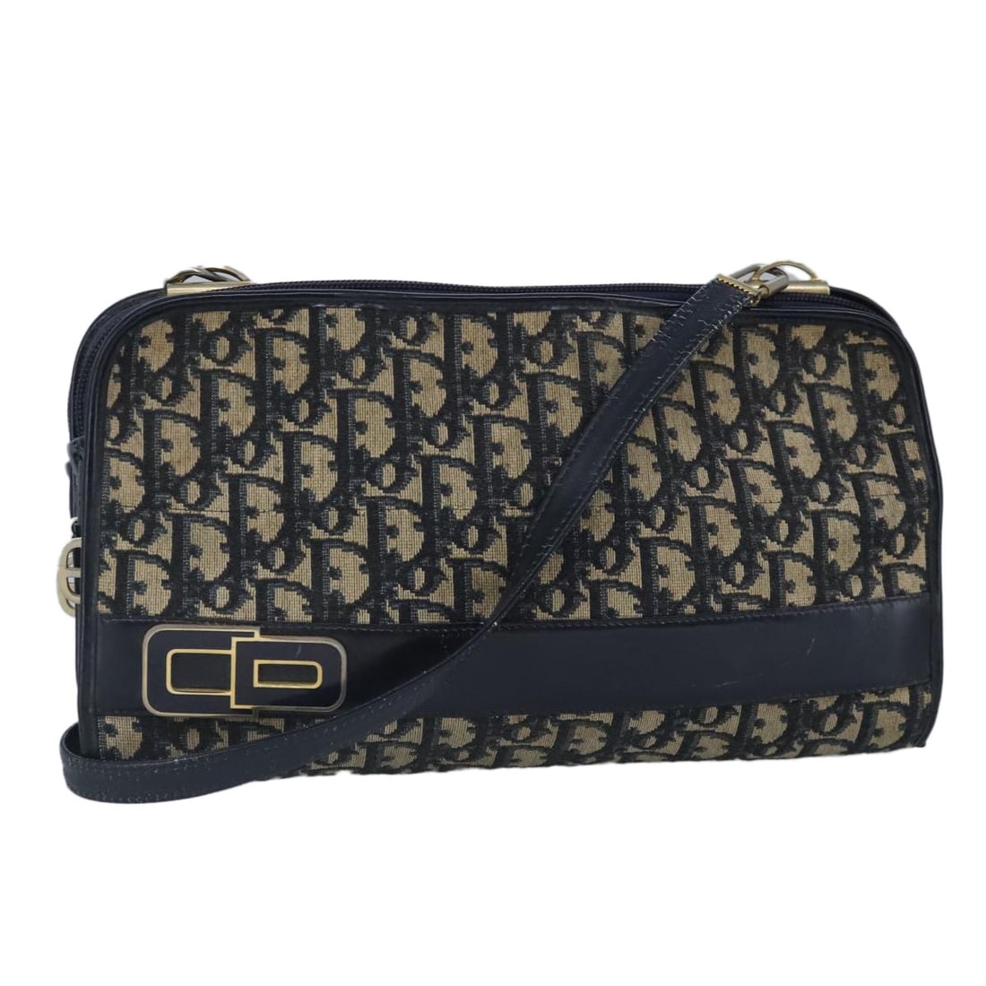 Christian Dior Navy Trotter Canvas Shoulder Bag Made in France: Christian Dior Navy Trotter Canvas Shoulder Bag Made in France Introducing the Christian Dior Trotter Canvas Shoulder Bag, a stylish accessory crafted in France. This bag features a classic navy canva