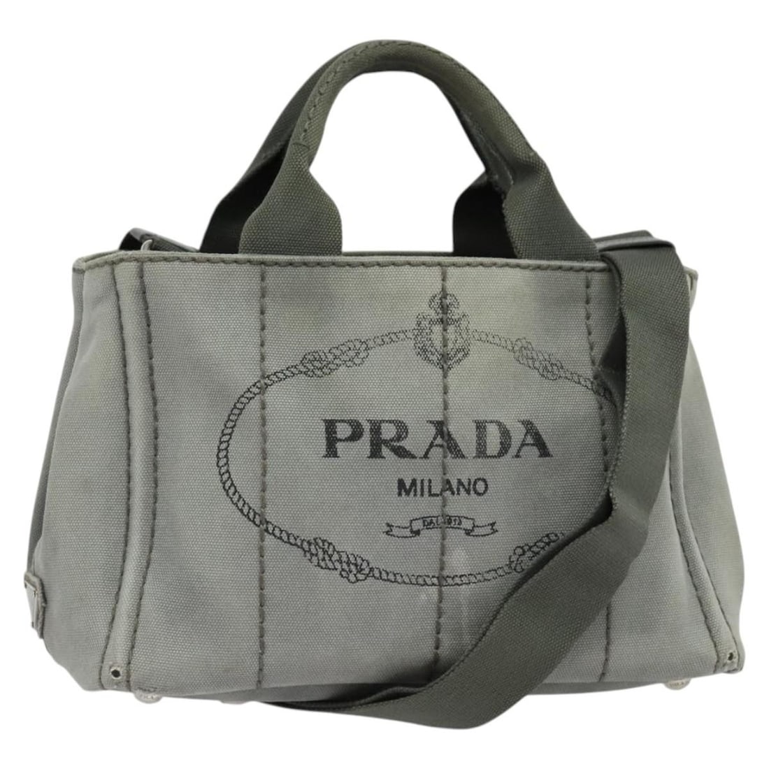 PRADA Canapa PM Gray Silver Hand Bag Canvas Authentic Italy: PRADA Canapa PM Gray Silver Hand Bag Canvas Authentic Italy This PRADA Canapa PM Hand Bag is a stylish and functional accessory made from durable canvas in a sophisticated gray and silver color combin